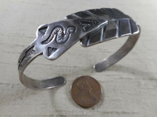 Fred Harvey Era Navajo Coin Silver Arrow Bracelet With Snake & Whirling Log