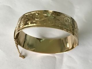 Vintage 9 ct gold metal core engraved wide bangle bracelet.  3/4”. 2