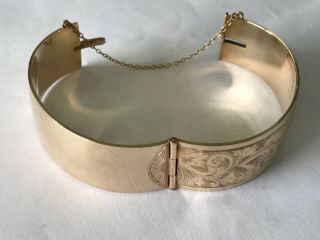 Vintage 9 ct gold metal core engraved wide bangle bracelet.  3/4”. 6
