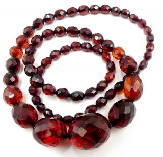 Vintage Faceted Cherry Amber Bakelite Beads Necklace 31” ½ L 56.  5 Gram