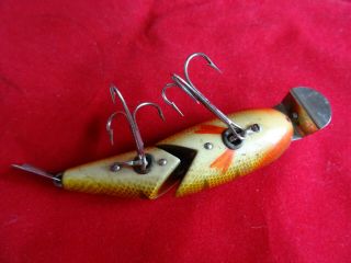 A RARE EARLY MODEL UNNAMED D.  A.  M WIGGLE FISH DAM FISHING LURE 5