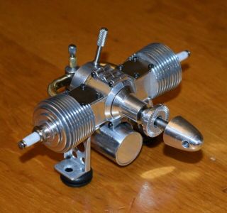 Unknown Twin Cylinder Ignition 1.  7cc model airplane engine.  10 vintage fuel tank 2