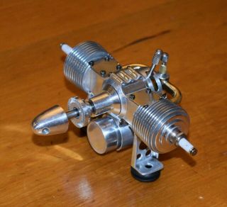 Unknown Twin Cylinder Ignition 1.  7cc model airplane engine.  10 vintage fuel tank 3