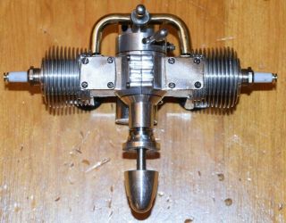 Unknown Twin Cylinder Ignition 1.  7cc model airplane engine.  10 vintage fuel tank 5