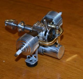 Unknown Twin Cylinder Ignition 1.  7cc model airplane engine.  10 vintage fuel tank 6