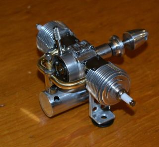 Unknown Twin Cylinder Ignition 1.  7cc model airplane engine.  10 vintage fuel tank 7