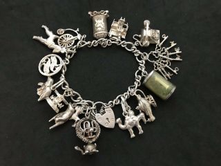Vintage Sterling Silver Charm Bracelet With 16 Silver Charms.  60 Grams