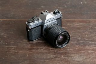 Vintage Asahi Pentax K1000 35mm Slr Camera W/ 35mm - 75mm F3.  5 - 4.  8 Zoom Lens