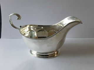 Silver Sauce Boat With Faceted Body