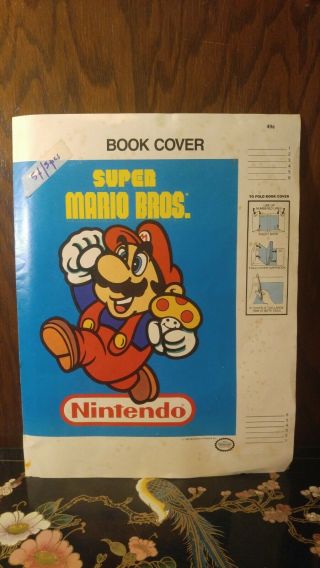 Vintage 1989 Mario Bros.  & Zelda Ii: The Adventures Of Zelda Book Cover