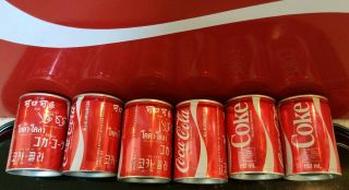 VTG XXX RARE FULL NOS UNCIRCULATED COCA - COLA Foreign Alum.  SIX Cans - 150 ml 7