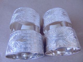 PRETTY SET OF 4 STERLING SILVER NAPKIN RINGS,  BOXED 6