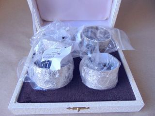 PRETTY SET OF 4 STERLING SILVER NAPKIN RINGS,  BOXED 8