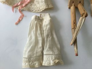 Antique Grodnertal jointed peg wooden doll dressed embroidered linen and lace 5