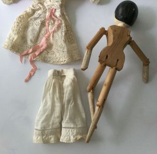 Antique Grodnertal jointed peg wooden doll dressed embroidered linen and lace 6