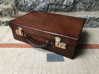 An Antique Vintage Tan Leather Briefcase