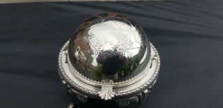 A antique Silver Plated roll top butter dish with engraved patterns. 2