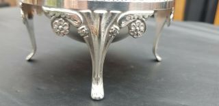 A antique Silver Plated roll top butter dish with engraved patterns. 4