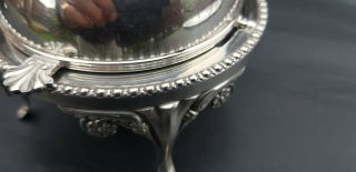 A antique Silver Plated roll top butter dish with engraved patterns. 5