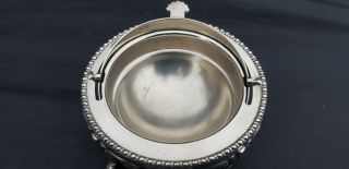 A antique Silver Plated roll top butter dish with engraved patterns. 8