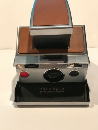 Classic Vintage Polaroid Sx70 Camera In Tan Leather