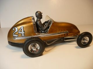 Vintage Ohlsson & Rice Inc. ,  Tether Car 24 In Gold Color With Driver