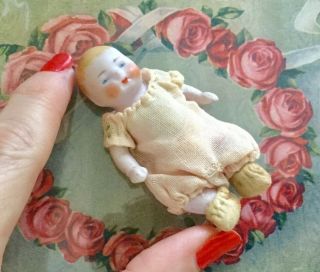 German Antique Bisque Hertwig Candy Baby Doll 2 3/4 Inches With Jammies Booties