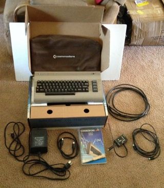 Commodore 64 Vintage Computer And Accesories With Brown Cover