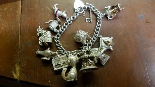 Lovely Vintage Solid Silver Charm Bracelet &12 Charms.  Moving Carousel Cinderella