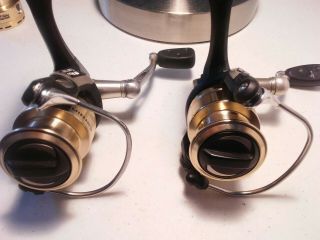 Rare 2 Vintage Abu Garcia 801 spinning reels one 99.  5 the other 98.  5.  Unfished 2
