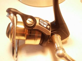 Rare 2 Vintage Abu Garcia 801 spinning reels one 99.  5 the other 98.  5.  Unfished 5