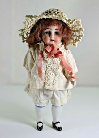 Antique German All Bisque Doll With Glass Eyes,  Jointed Arms And Legs,  No.  203