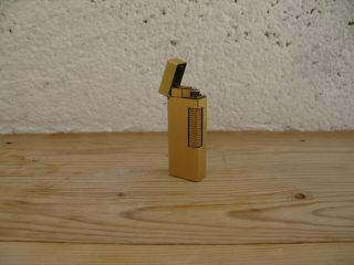 Vintage Accendino Dunhill Rollagas Lighter Gold plated Made switzerland. 2
