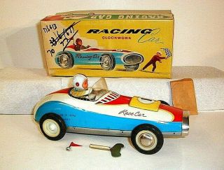 China Tin Toy Race Car.  Ms 613 (w/u) Rare 9.  5 ".  Driver Waves Flag