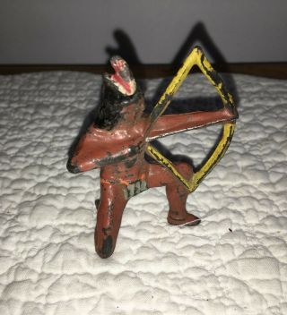 Antique Painted Cast Metal Miniature Native American Indian Kneeling With Bow