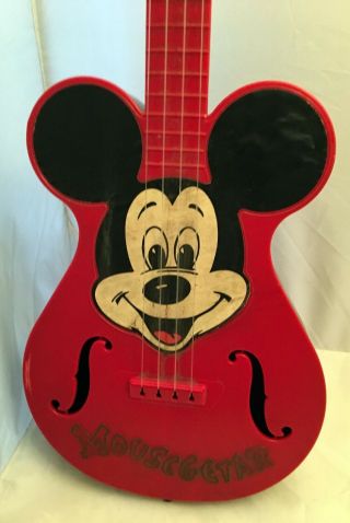 1960s Mattel Mickey Mouse red plastic Mousegetar,  8x22x3.  5 inches,  dirty decal 2