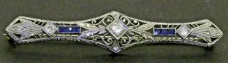 Antique Platinum Elegant.  64ctw Vs/g Diamond & Blue Sapphire Filigree Bar Brooch