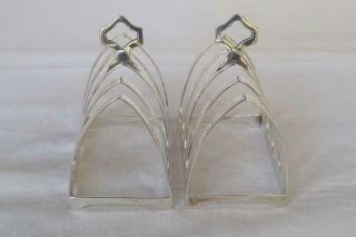 A SOLID STERLING SILVER FIVE BAR TOAST RACKS SHEFFIELD 1938. 3