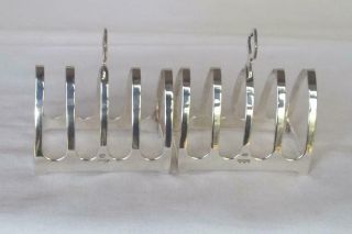 A SOLID STERLING SILVER FIVE BAR TOAST RACKS SHEFFIELD 1938. 5