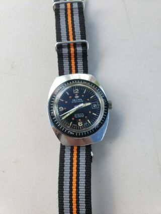 Vintage Delma of Switzerland Automatic 25 jewel,  6 ATM divers watch. 4