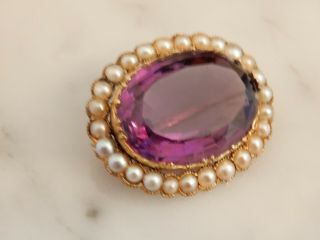 AN EXCEPTIONAL ANTIQUE GOLD OVAL 15.  00 CARAT AMETHYST AND PEARL BROOCH 6