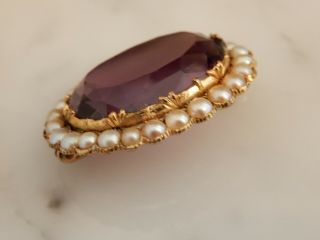 AN EXCEPTIONAL ANTIQUE GOLD OVAL 15.  00 CARAT AMETHYST AND PEARL BROOCH 8