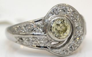 VINTAGE PLATINUM RING WITH 1.  15 CTW DIAMONDS YELLOW DIAMOND I21 5