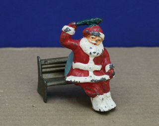 Vintage Barclay B196 Seated Santa W Holly Sprig & Bag Of Toys Cast Metal