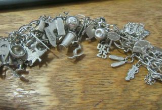 Vintage Charm Bracelet Loaded With About 40 Sterling Silver Different Charms