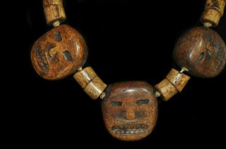 Unique vintage tribal stone necklace from India has carved faces 26 