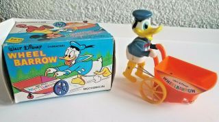 Vintage Marx Walt Disney Mechanical Donald Duck Wheel Barrow Toy