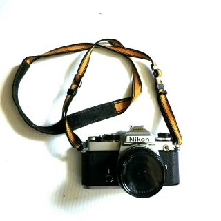 Nikon Fe Vintage 35mm Film Camera With 28mm Lens Polarized