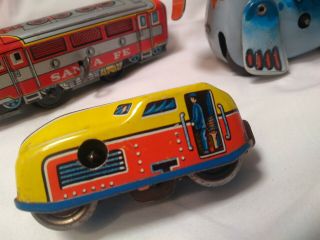3 Antique Tin Wind Up toys seal Dante Fe locomotive Japan China Western Germany 2