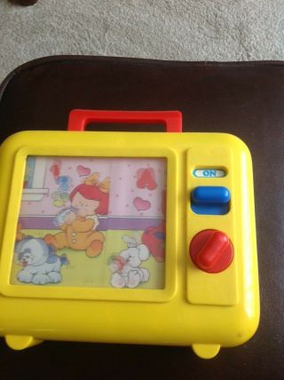 Vintage Shelcore Musical Windup Tv/radio Plays Toyland On Moving Yellow Screen